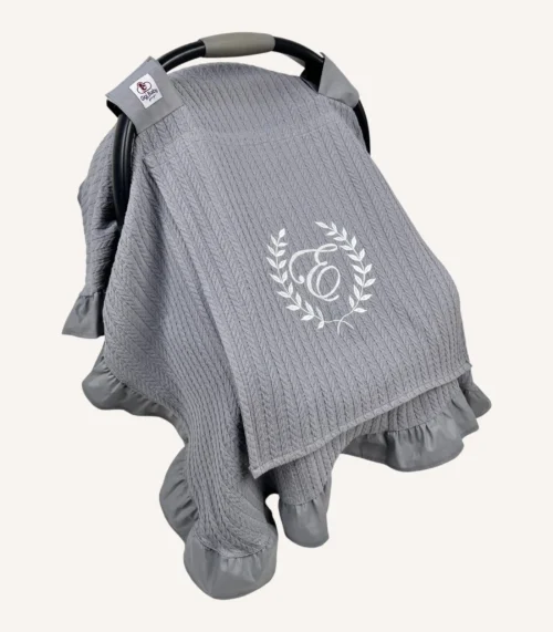 Antrasit örgü pike kumaştan, kenarları fırfırlı, kapak kısmı düz, fiyonklu veya fiyonsuz hazırlanabilen puset örtüsü.