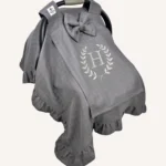 Antrasit tek kat müslin kumaştan fırfırlı, kapaklı puset örtüsü; tül pencereli ve kişiselleştirilebilir nakış detaylı model.