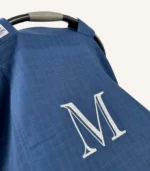 Denim mavi tek kat müslin kumaştan, fırfırsız, kapaklı ve tül pencereli, kişiselleştirilebilir puset örtüsü.