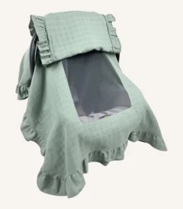 Haki tek kat müslin kumaştan, kapaklı ve kapak kenarları fırfırlı, tül pencereli, kişiselleştirilebilir puset örtüsü.