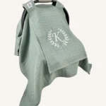 Haki tek kat müslin kumaştan, fırfırsız, kapaklı ve tül pencereli, kişiselleştirilebilir puset örtüsü.