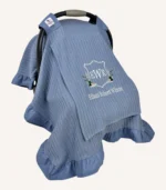 İndigo mavi örgü pike kumaştan, fırfırlı kenarlara sahip, sade kapaklı puset örtüsü.