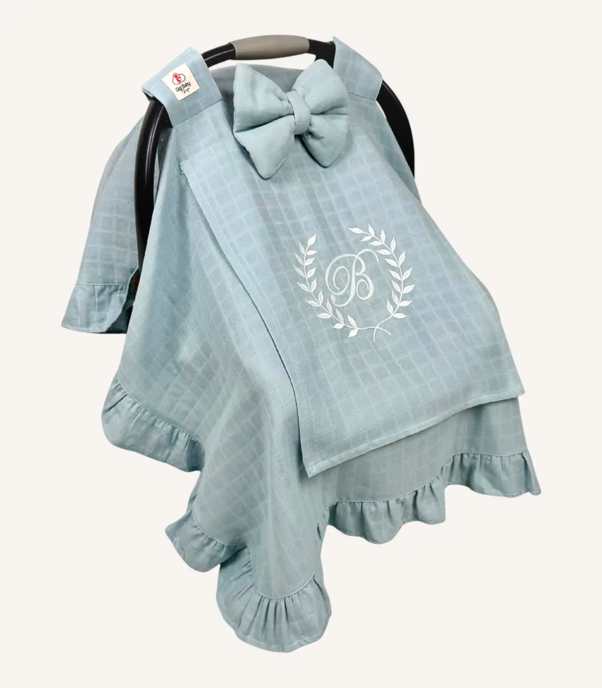 mint-tek-kat-muslin-firfirli-puset-ortusu Mint tek kat müslin kumaştan fırfırlı, kapaklı puset örtüsü; tül pencereli ve kişiselleştirilebilir nakış detaylı model.