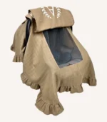 Taş tek kat müslin kumaştan fırfırlı, kapaklı puset örtüsü; tül pencereli ve kişiselleştirilebilir nakış detaylı model.