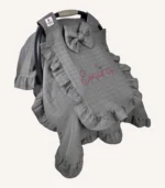 Antrasit tek kat müslin kumaştan, kenarları ve kapak bölümü fırfırlı puset örtüsü.