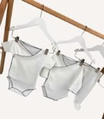 Ekru 8’li organik hastane çıkış seti; kroşeli yastık, battaniye, tulum, ayı şapka, zıbınlar ve müslin puset örtüsü