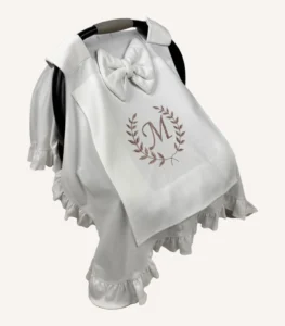 Ekru organik pamuk interlok, kenarları fırfırlı ve fırfır kenarlarında kroşe detaylı puset örtüsü