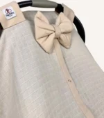 Bej müslin puset örtüsü, mini fiyonklu, ortadan yırtmaçlı çıtçıtlı model, akfil fırfırlı, tek kat hafif yazlık bebek puset örtüsü