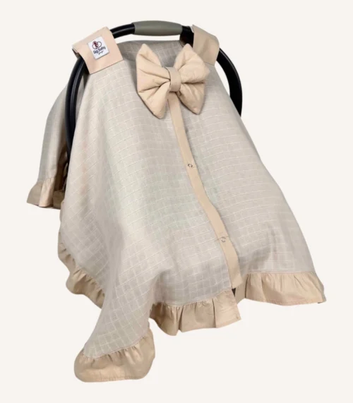 Bej müslin puset örtüsü, mini fiyonklu, ortadan yırtmaçlı çıtçıtlı model, akfil fırfırlı, tek kat hafif yazlık bebek puset örtüsü