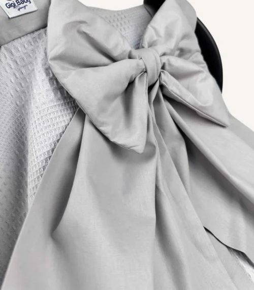 Gri dama pike puset örtüsü, fiyonklu, ortadan yırtmaçlı çıtçıtlı model, fırfırlı kenarlı, %100 pamuk bebek puset örtüsü