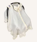 Krem müslin puset örtüsü, mini fiyonklu, ortadan yırtmaçlı çıtçıtlı model, akfil fırfırlı, tek kat hafif yazlık bebek puset örtüsü