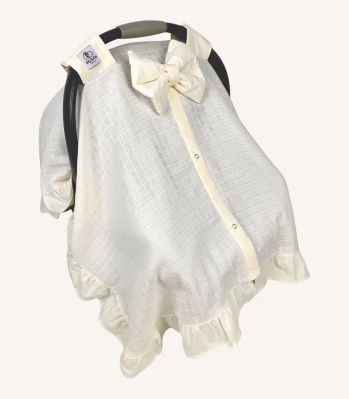 Krem müslin puset örtüsü, mini fiyonklu, ortadan yırtmaçlı çıtçıtlı model, akfil fırfırlı, tek kat hafif yazlık bebek puset örtüsü