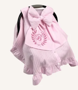 Pembe örgü pike puset örtüsü, fiyonklu, ortadan yırtmaçlı çıtçıtlı model, fırfırlı kenarlı, %100 pamuk bebek puset örtüsü